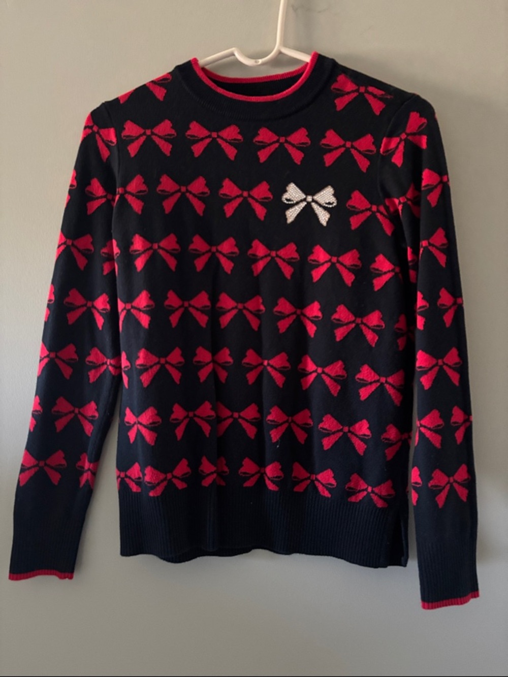 Charter Club Black Crewneck Sweater with Red Bow Motif and Silver Accent